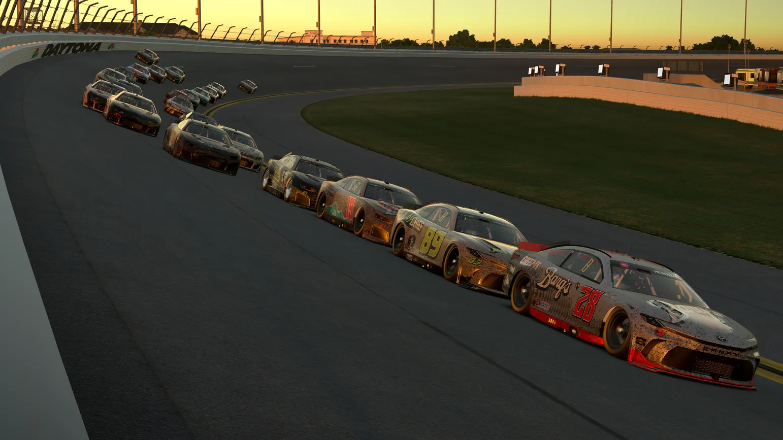 Cyber Thunder stock cars racing in a close pack at Daytona at sunset
