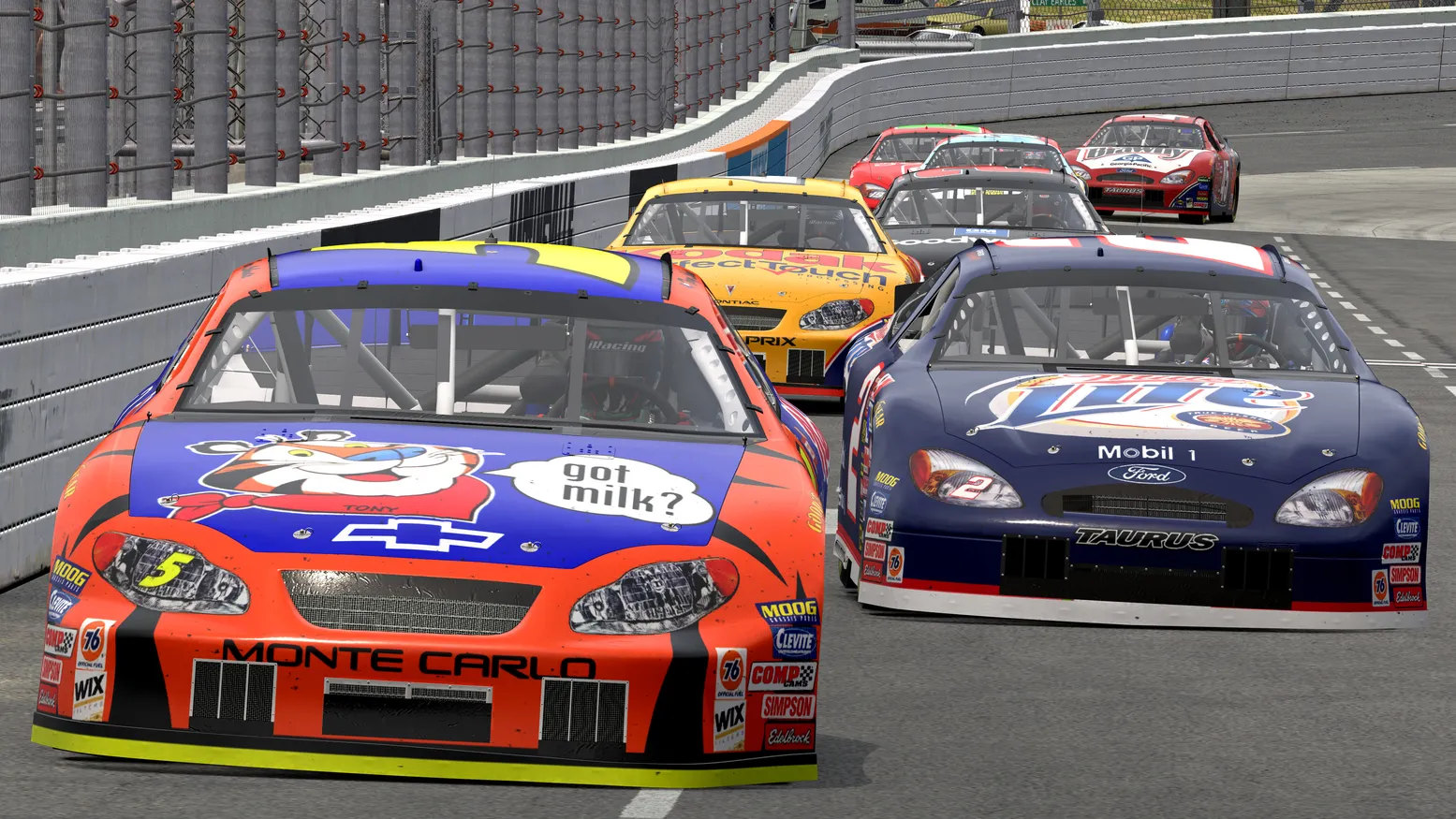 Past-season Cyber Thunder stock cars racing side by side at Martinsville